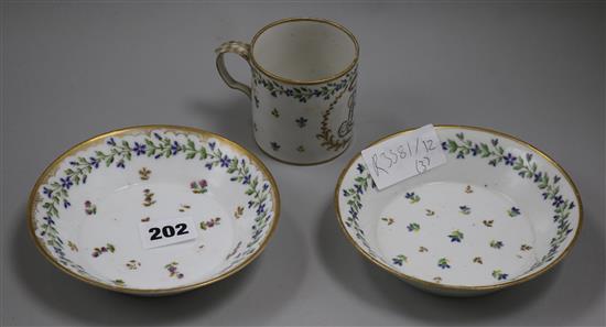 A Sevres style cup and two saucers